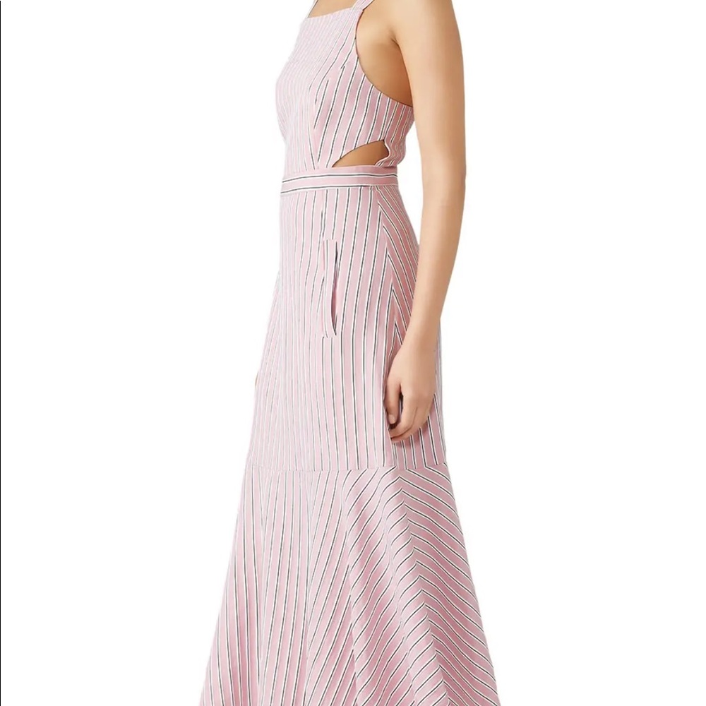 Fabulous Tibi dress in size 6. Near to the floor flip skirt with intricate back